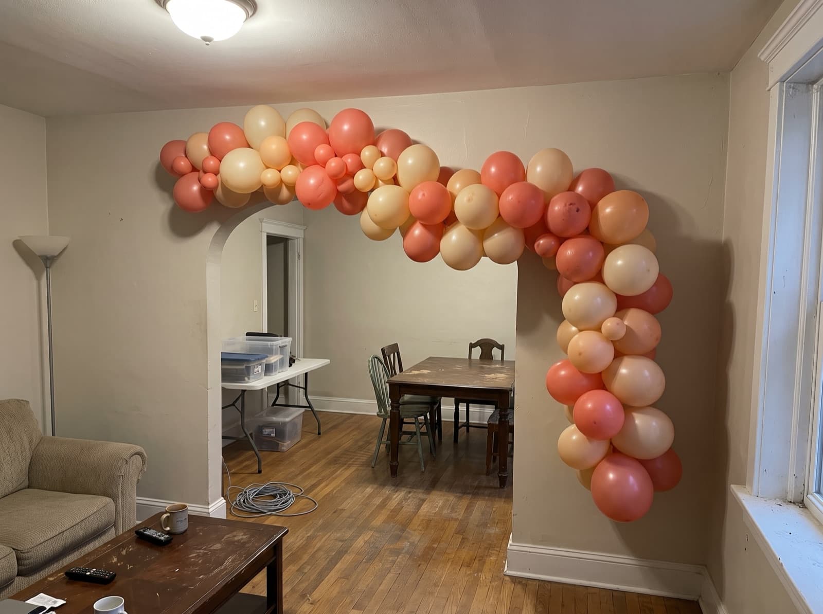 Balloon garland around an arched plaster doorway